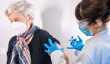 Nurse Administering a Covid Vaccine